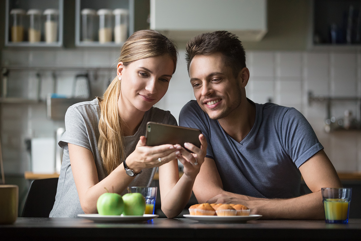 couple looking at phone